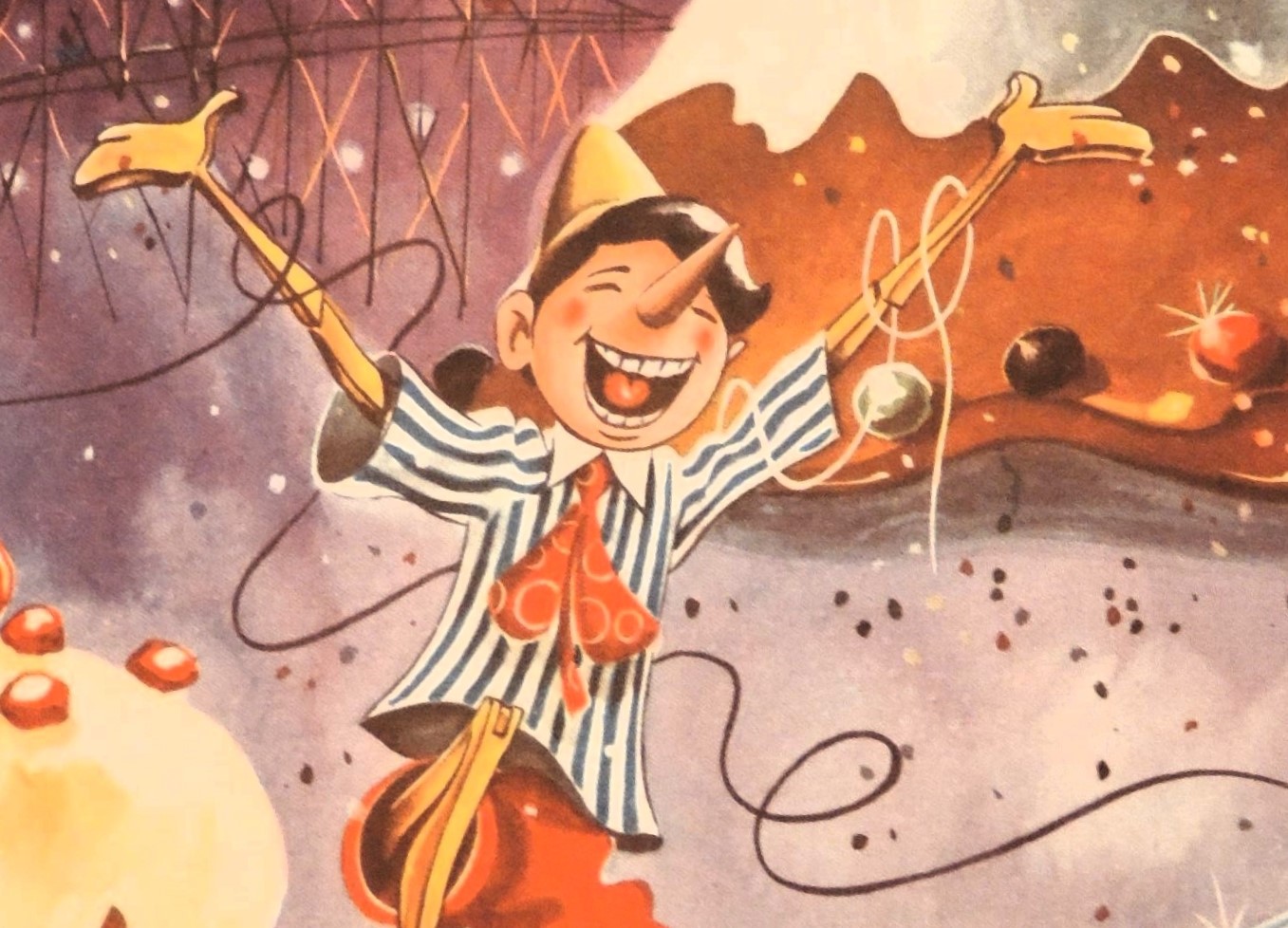 Immagine di Pinocchio con braccia aperte, fili tra le mani e sorridente.
